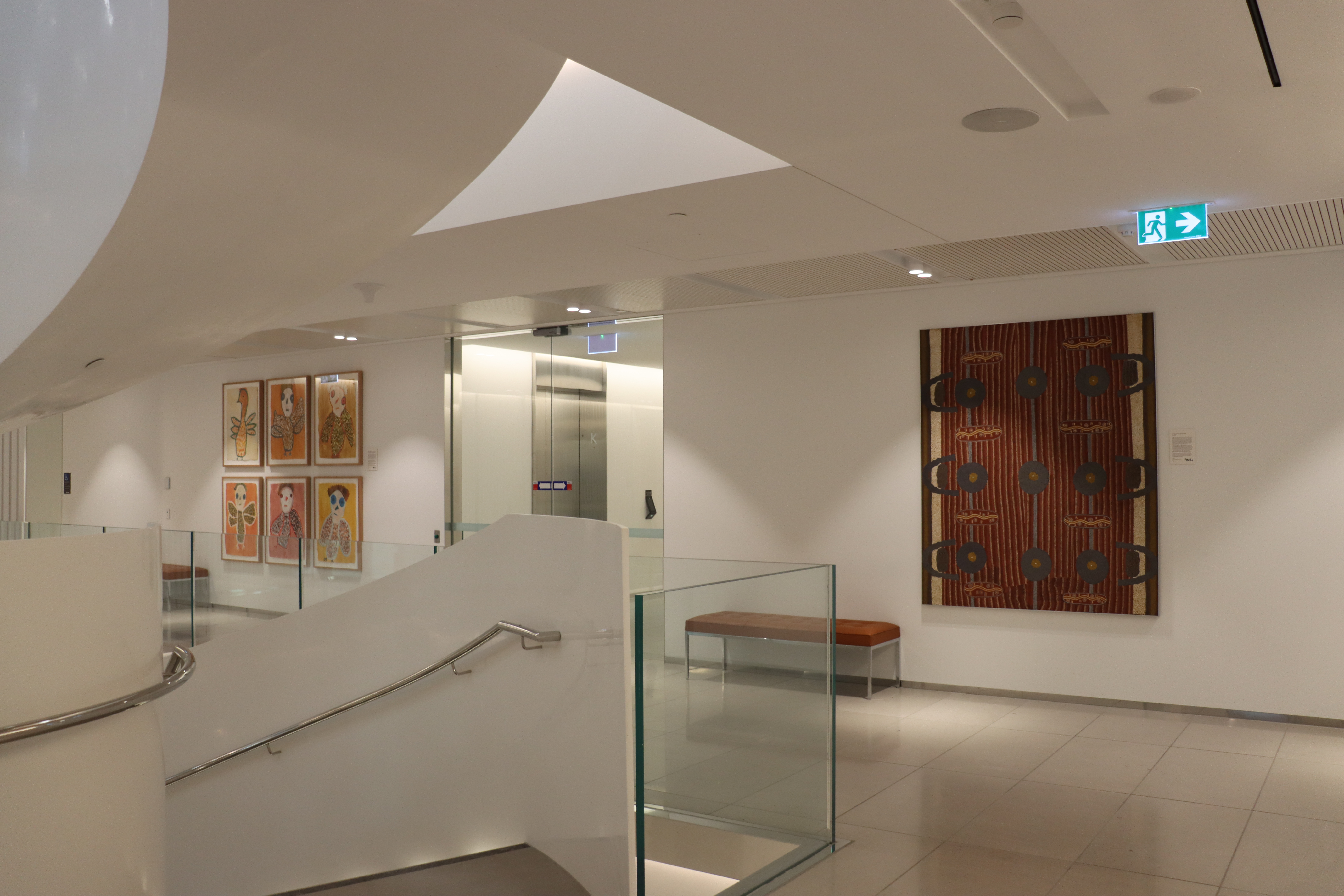 Installation view, Artbank client Brookfield Sydney featuring artwork by Trudy Inkamala and Turkey Tolson Tjupurrula, Sydney, 2024.