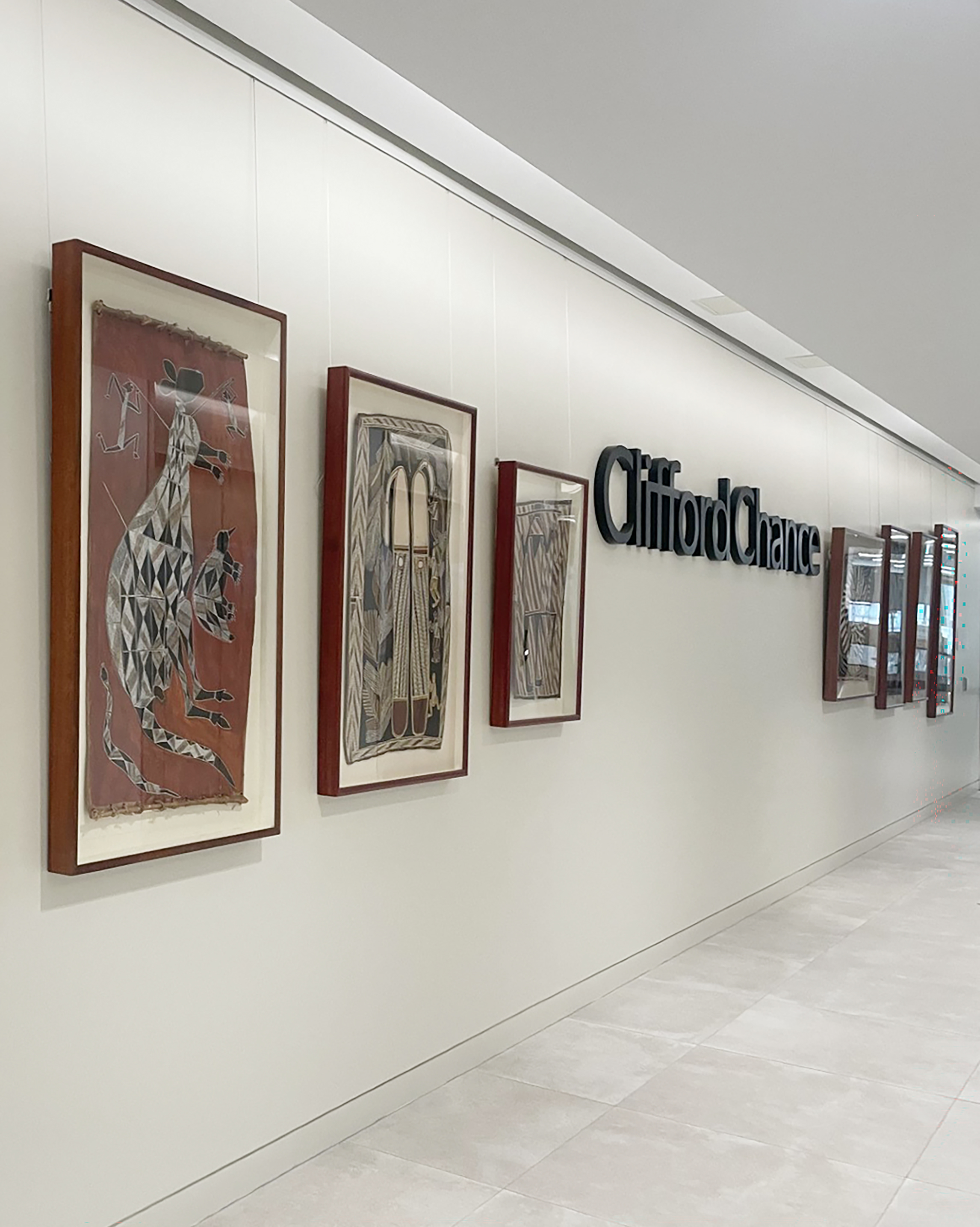 Installation view, Artbank client Clifford Chance featuring artworks by Bobby Barrdjaray Nganjmirra, Ray Munyal and Ronnie Djanbardi, 2026. Photo: Clifford Chance.