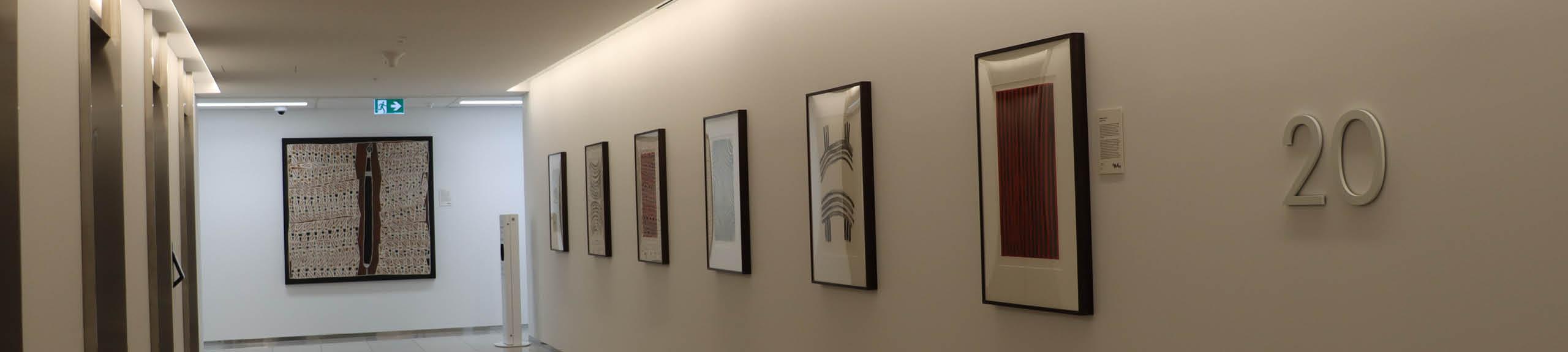 Installation view, Artbank client Brookfield featuring artworks by Gladdy Kemarre and Dorothy Djukulul, Sydney, 2024.