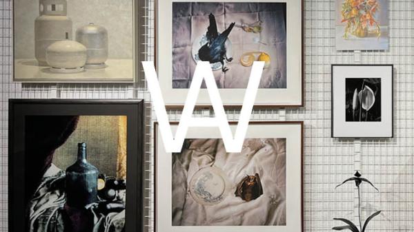 Artbank Window Graphic on top of salon style hang of still life artworks 