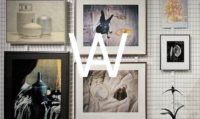 Artbank Window Graphic on top of salon style hang of still life artworks 